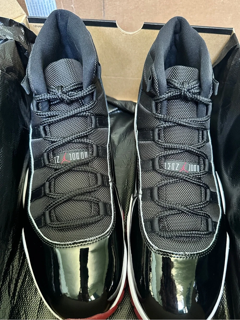Air Jordan 11 Retro 'Bred' High Top Sneakers - Black/Red